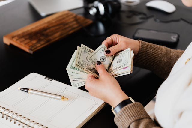 person counting money